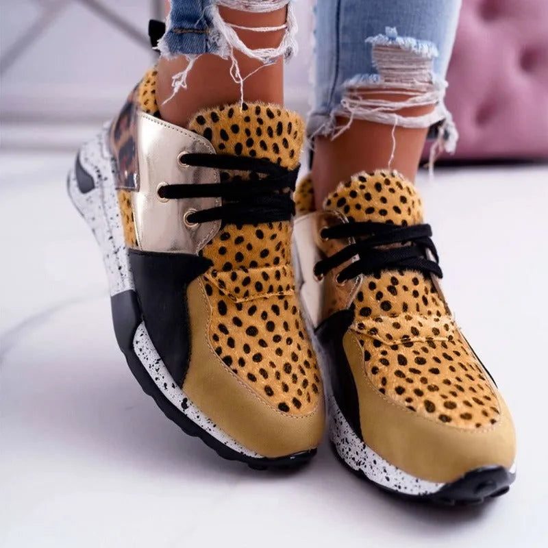 Women's casual suede flat sneakers with wedge heel in black, leopard, pink, panther, and snake pattern options.