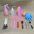 14-piece succulent gardening tool set showing mini shovels, tweezers, watering can, rake, and air blower on a table