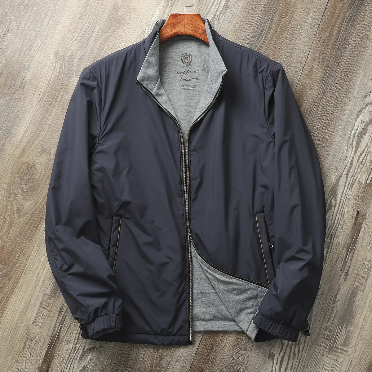 Men's stand collar casual jacket in polyester blend shown in army green colour.