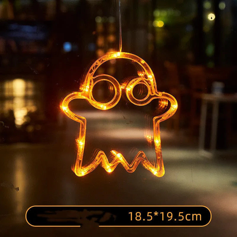 Halloween window hanging LED lights with spider pumpkin ghost designs and suction cup attachment
