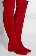 Grey suede women's flat over-the-knee boots with a pointed toe and thick low heel.