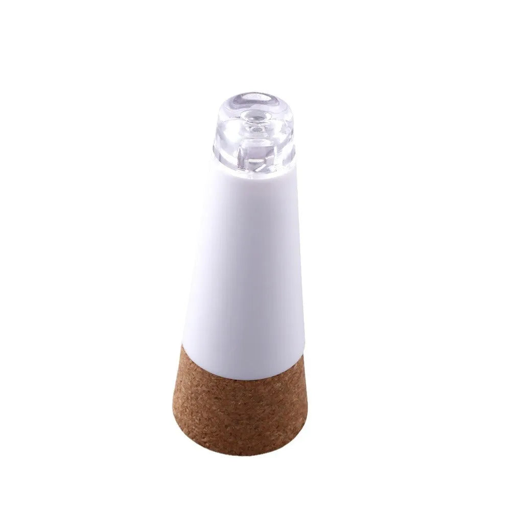 LED rechargeable bottle cap cork light showing plastic housing and 30mm diameter cork section