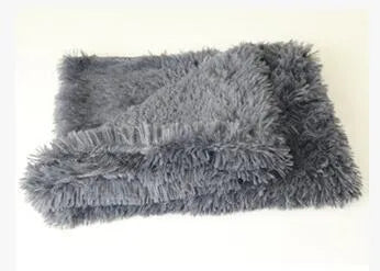 Soft long plush dog blanket in dark grey, sizes S M L shown next to a large dog.