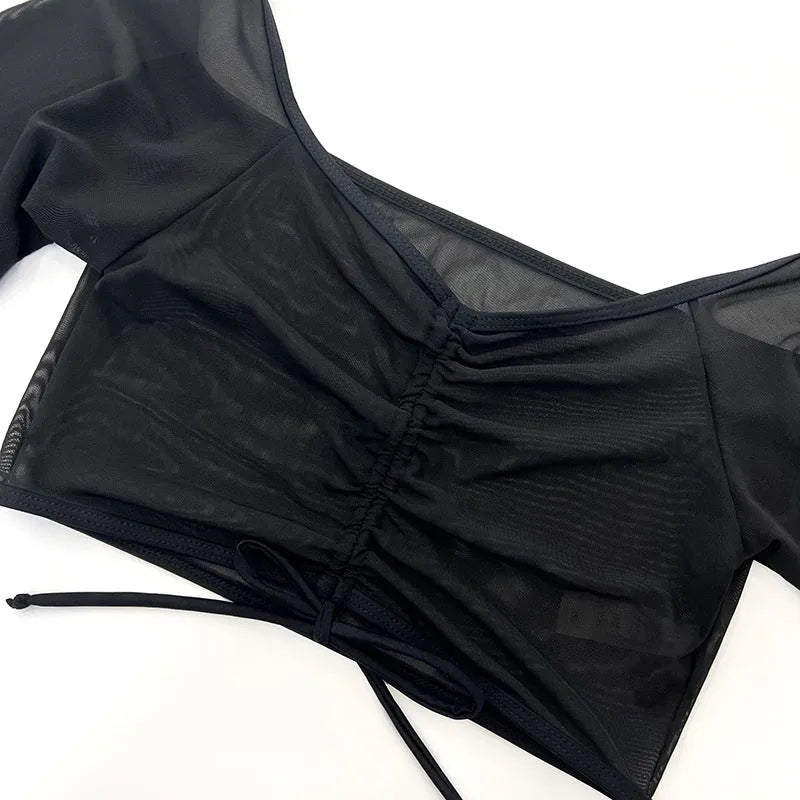 Black mesh women's four-piece bikini set with long sleeves and briefs bottoms for swimming sports