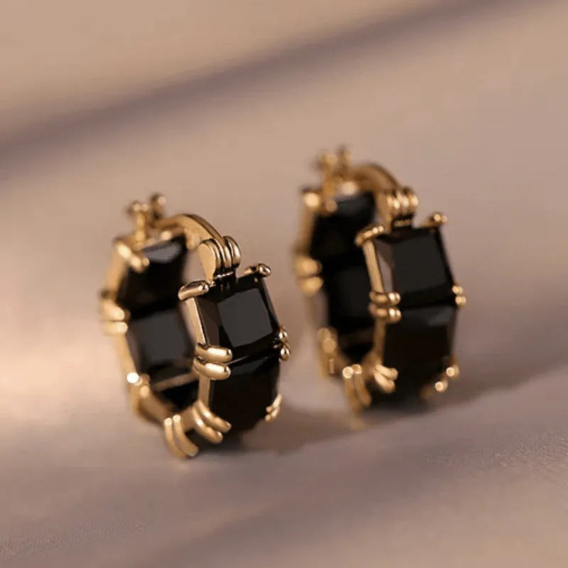 Geometric U-shaped women's earrings with round zircon crystals in gold plating