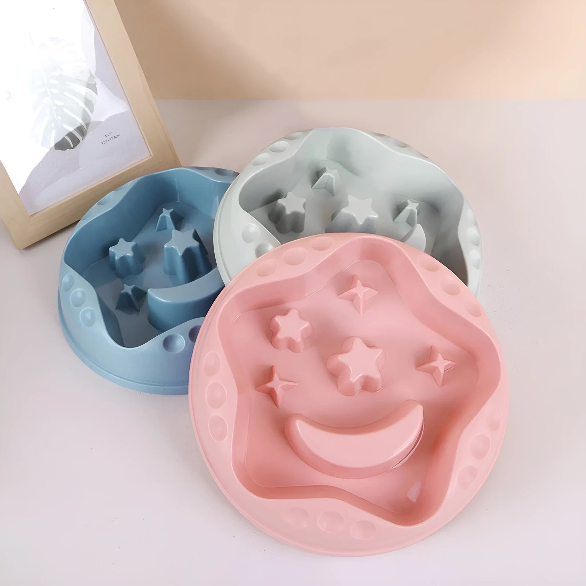 Blue Moon Star Wings slow feeder dog bowl showing raised centre with cut-outs and wide outer food channel.