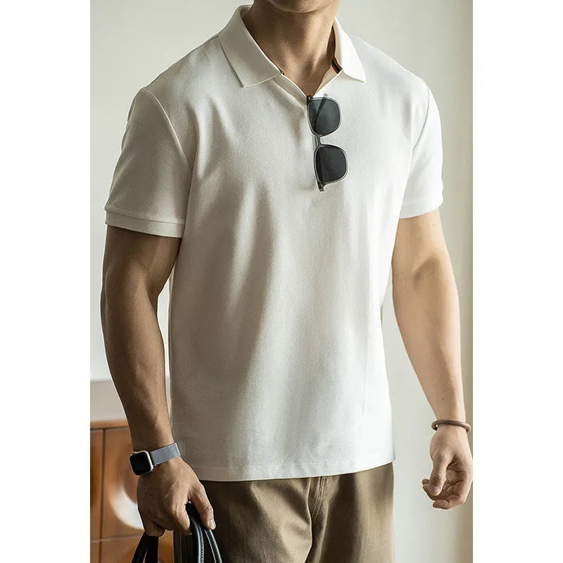 American-style cotton blend short-sleeved polo shirt in blue, shown in a regular fit for casual summer wear.