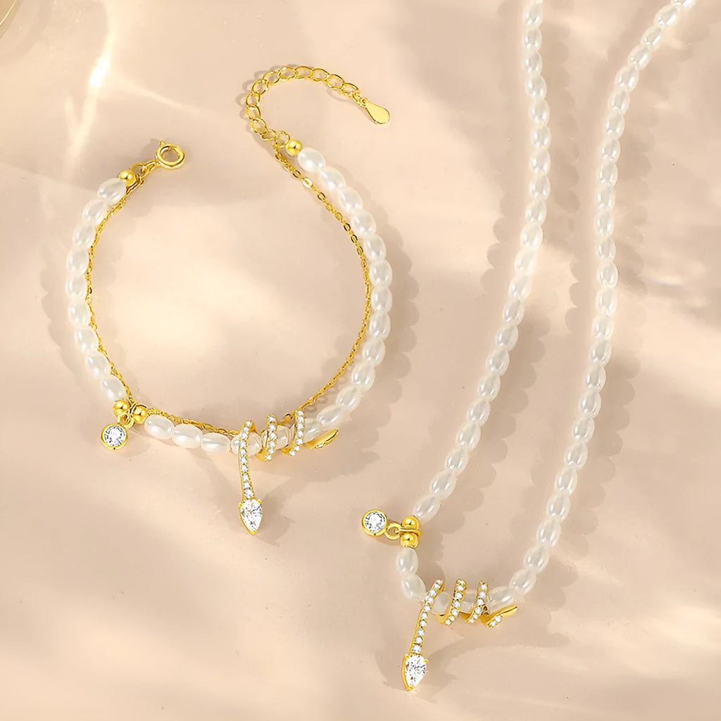 Pearl snake classic style bracelet in 925 silver with gold or white gold plating, featuring zodiac snake and geometric design