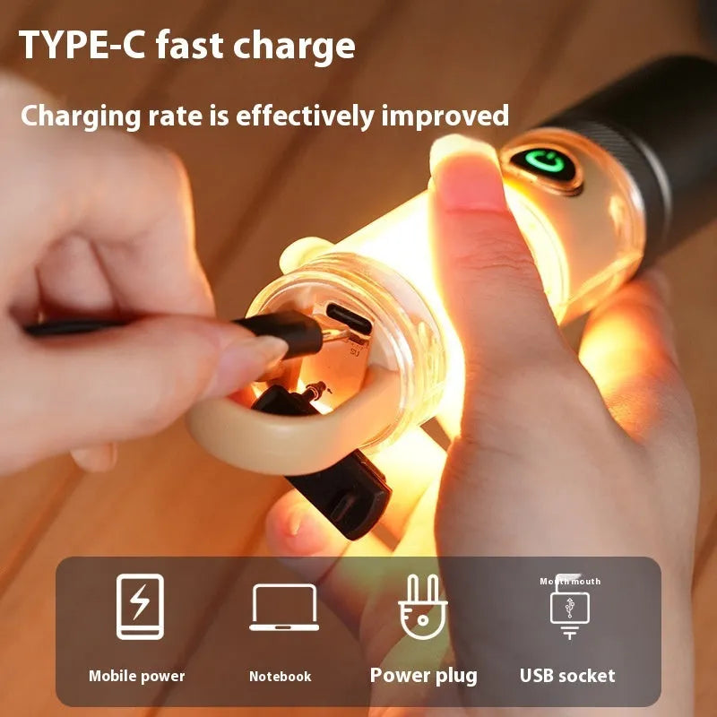 Orange multifunctional 10W flashlight with hook, keychain, and optical zoom on a white background.