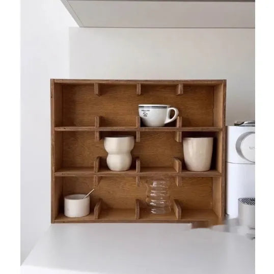 Solid wood square storage rack with multiple grid compartments in a birch wood meridian colour.