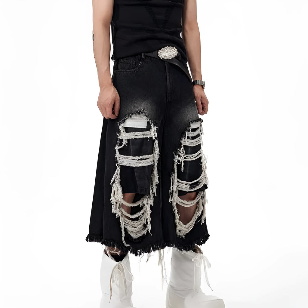 Black women's wide leg cropped jeans with ripped patch detail and a mid-high waist on a hanger.