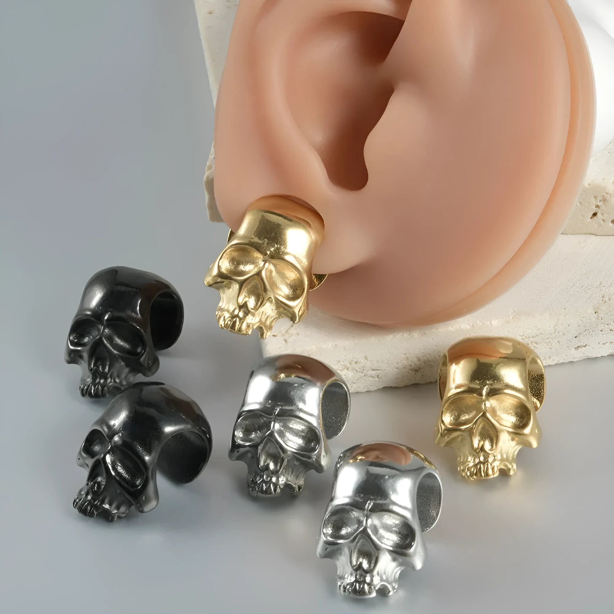 Stainless steel hollow skull Buddha earrings with geometric design in hip hop style