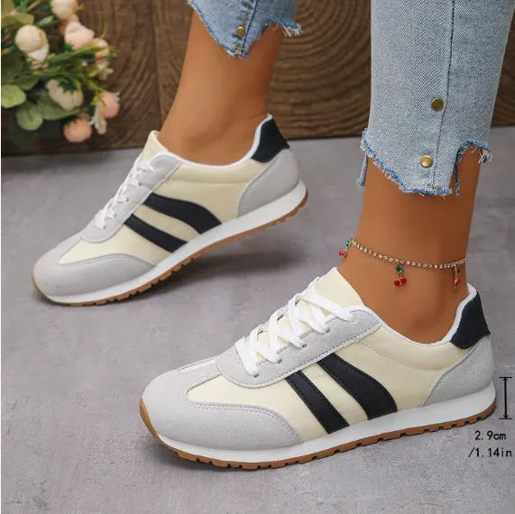 Blue and grey striped leisure sports shoes with round toe and flat rubber sole.
