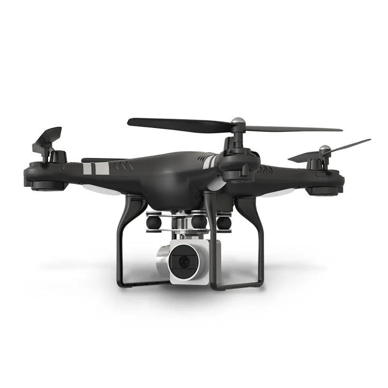 Black HD aerial photography drone with alloy body and remote control handle on a table.