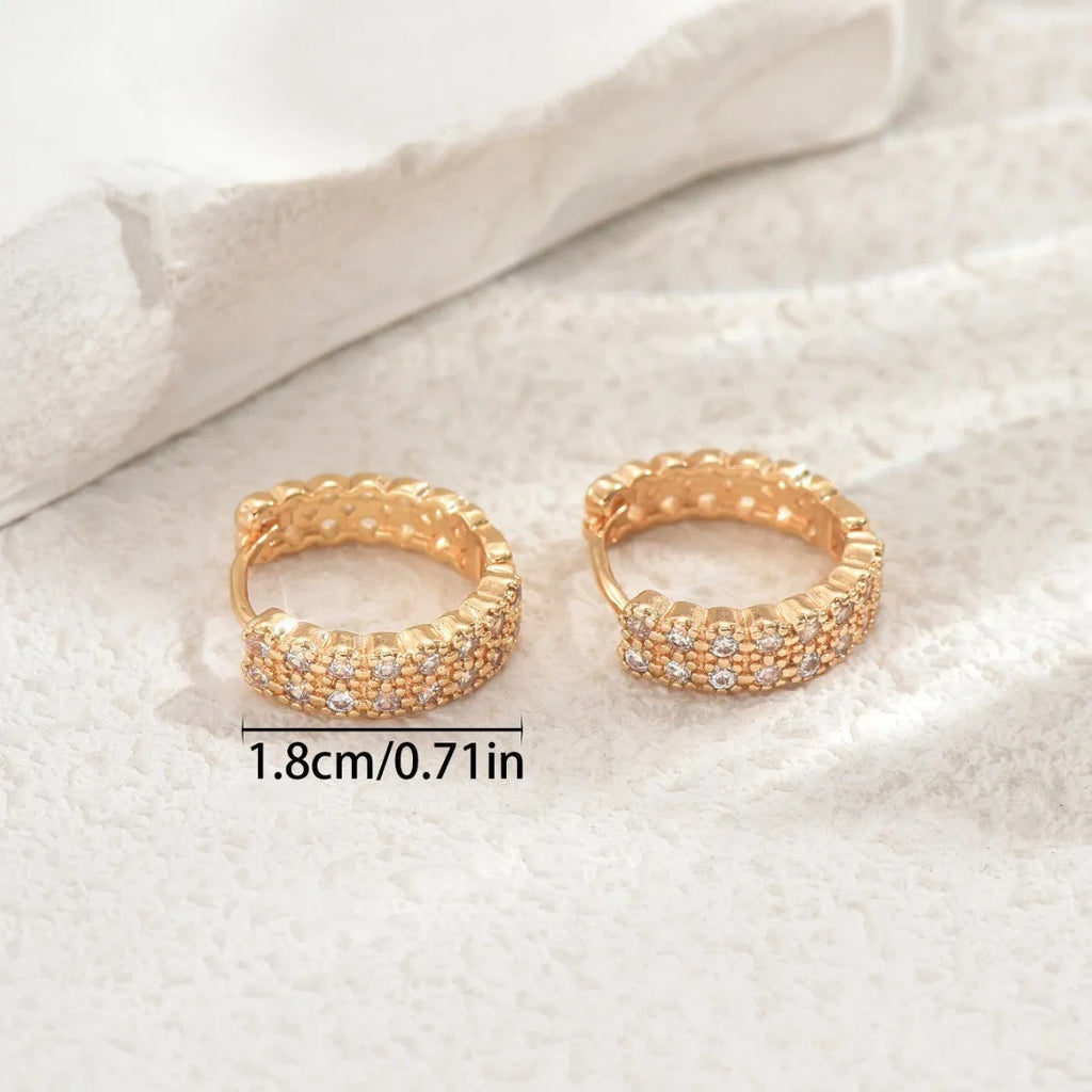 Geometric pattern copper ear studs with dot and ring design elements