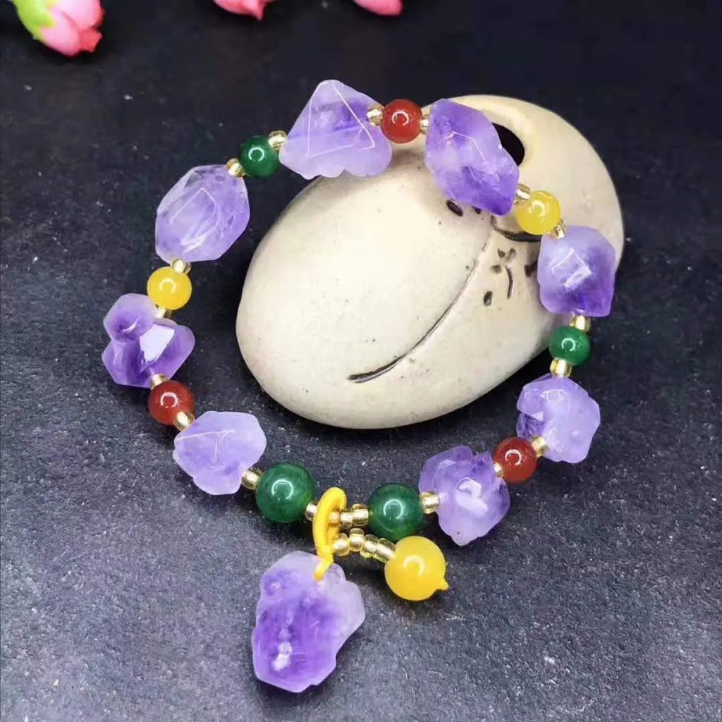 Natural shaped amethyst bracelet with fu character decoration for women's jewellery and gifting.