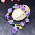 Natural shaped amethyst bracelet with fu character decoration for women's jewellery and gifting.