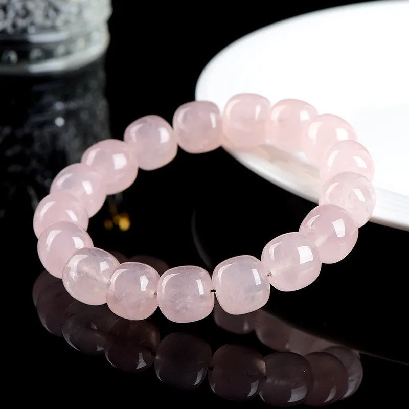 Pink bamboo crystal bracelet with 11mm barrel beads in original geometry design