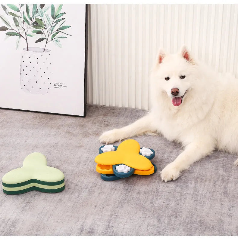Green and yellow dog puzzle toy with rotatable compartments and bone-shaped covers