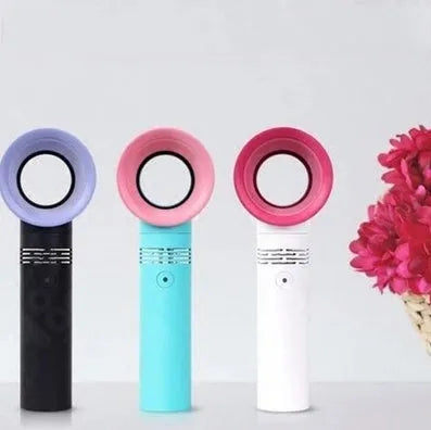 Compact portable bladeless fan in chosen colour on its base, with USB cable for charging.