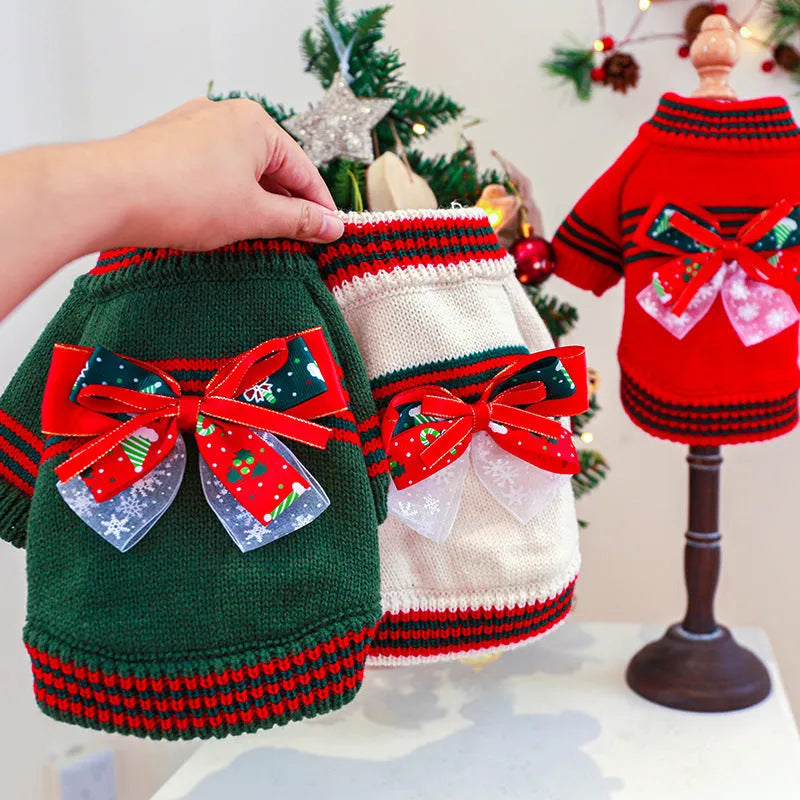 Red Christmas sweater for a dog on a festive background, showing the knit pattern and fit.