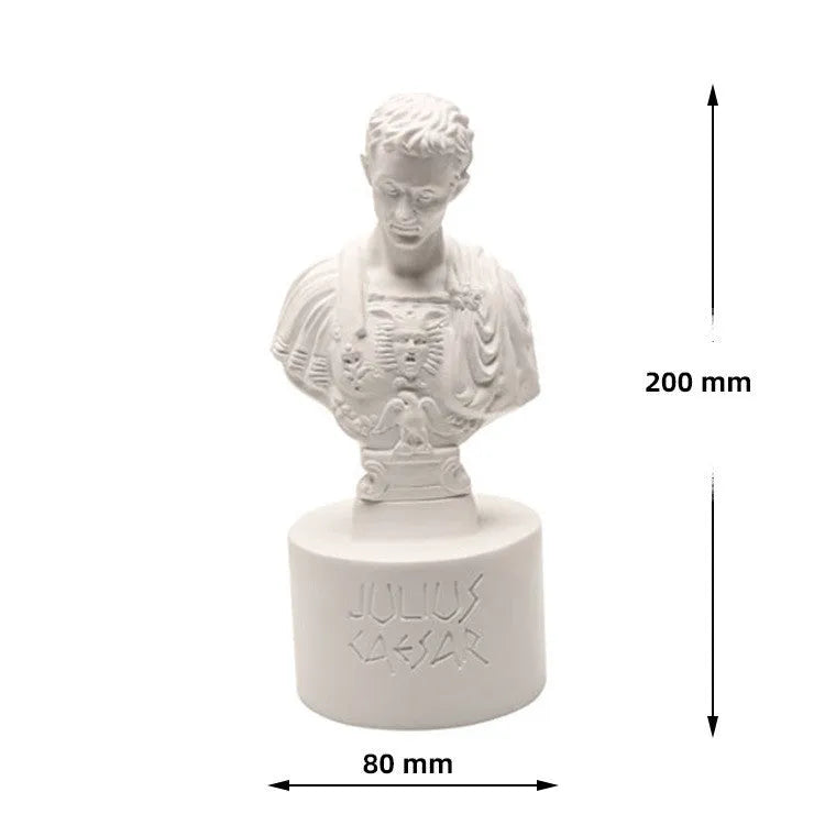 White American style character model pen holder made from synthetic resin on a desk.