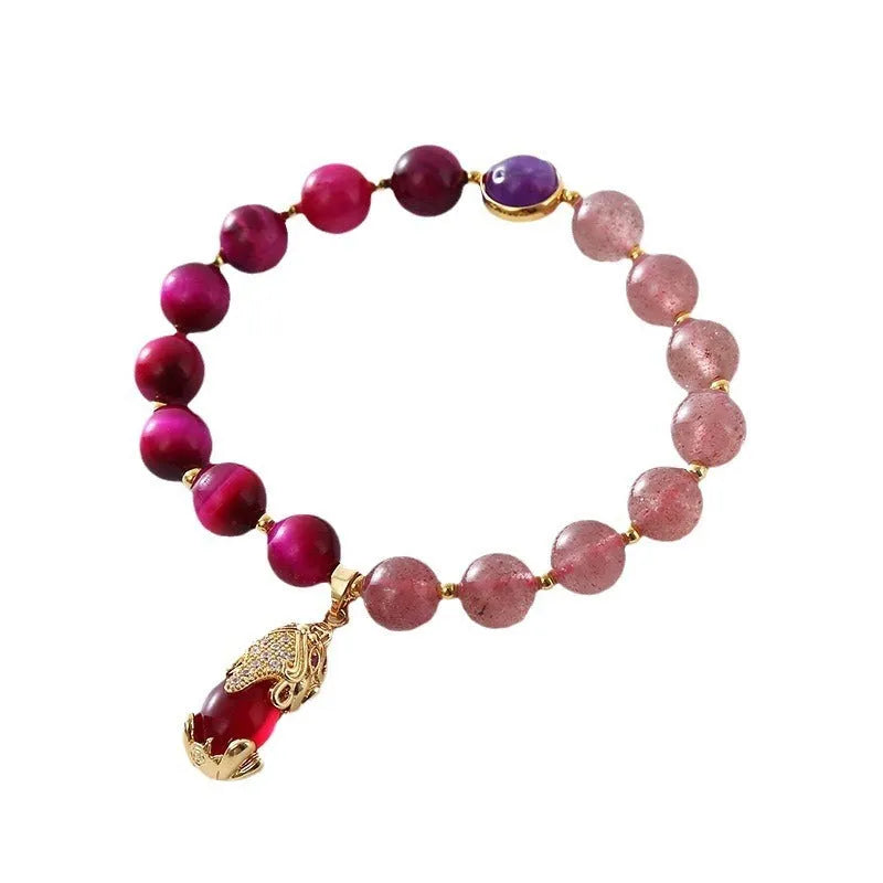 Simple women's bracelet with a strawberry crystal on an 18cm elastic rope band.