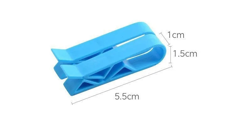 Grey PP plastic non-slip clip for fixing a bin bag to a waste bin rim.