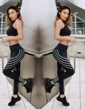 Women's black workout leggings with glow-in-the-dark print pattern for fitness activities