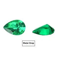 Loose cultivated emerald gemstone cabochon in Columbia green showing polished round and Asscher cut shapes.