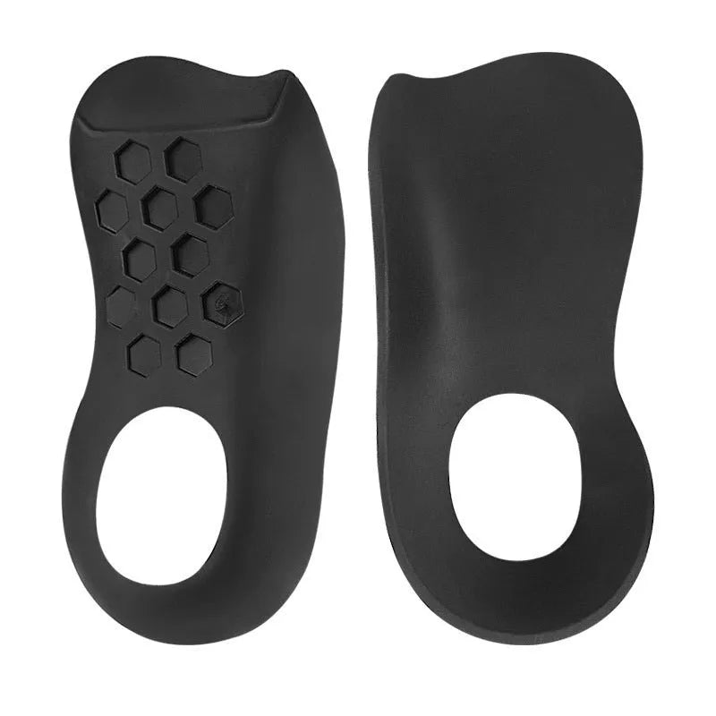 White arch support varus correction insole made from TPR material, shown next to a black and a skin colour version.