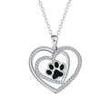 Original design heart-shaped copper necklace with a detailed dog paw print pendant on a cross chain.