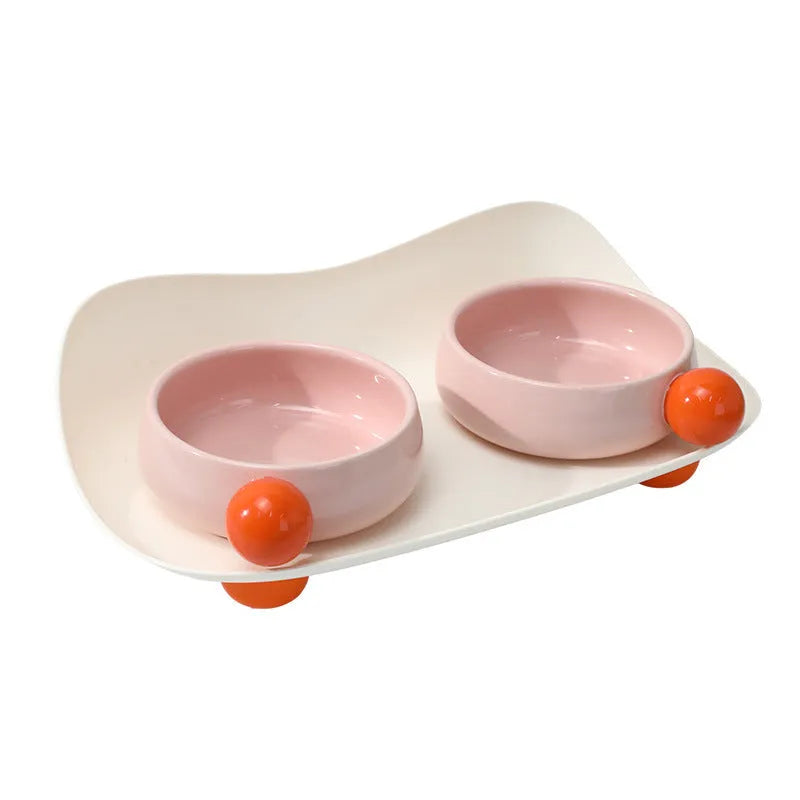Double ceramic pet bowl set in raised design with non-slip support for small dogs and cats