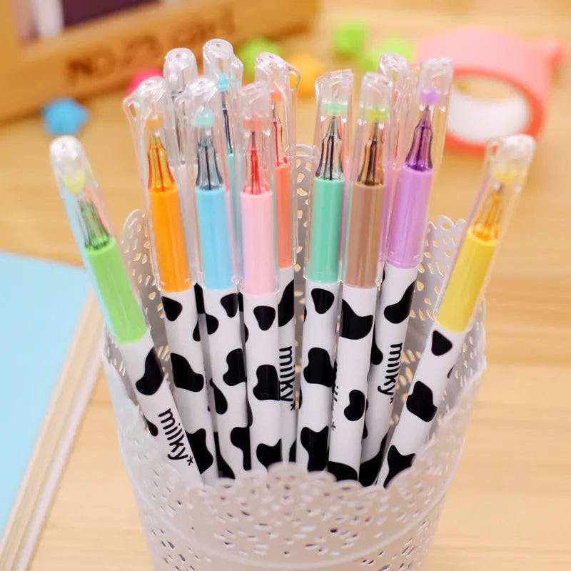 Pack of 12 cow print gel pens with 0.38mm fine tips in assorted colours