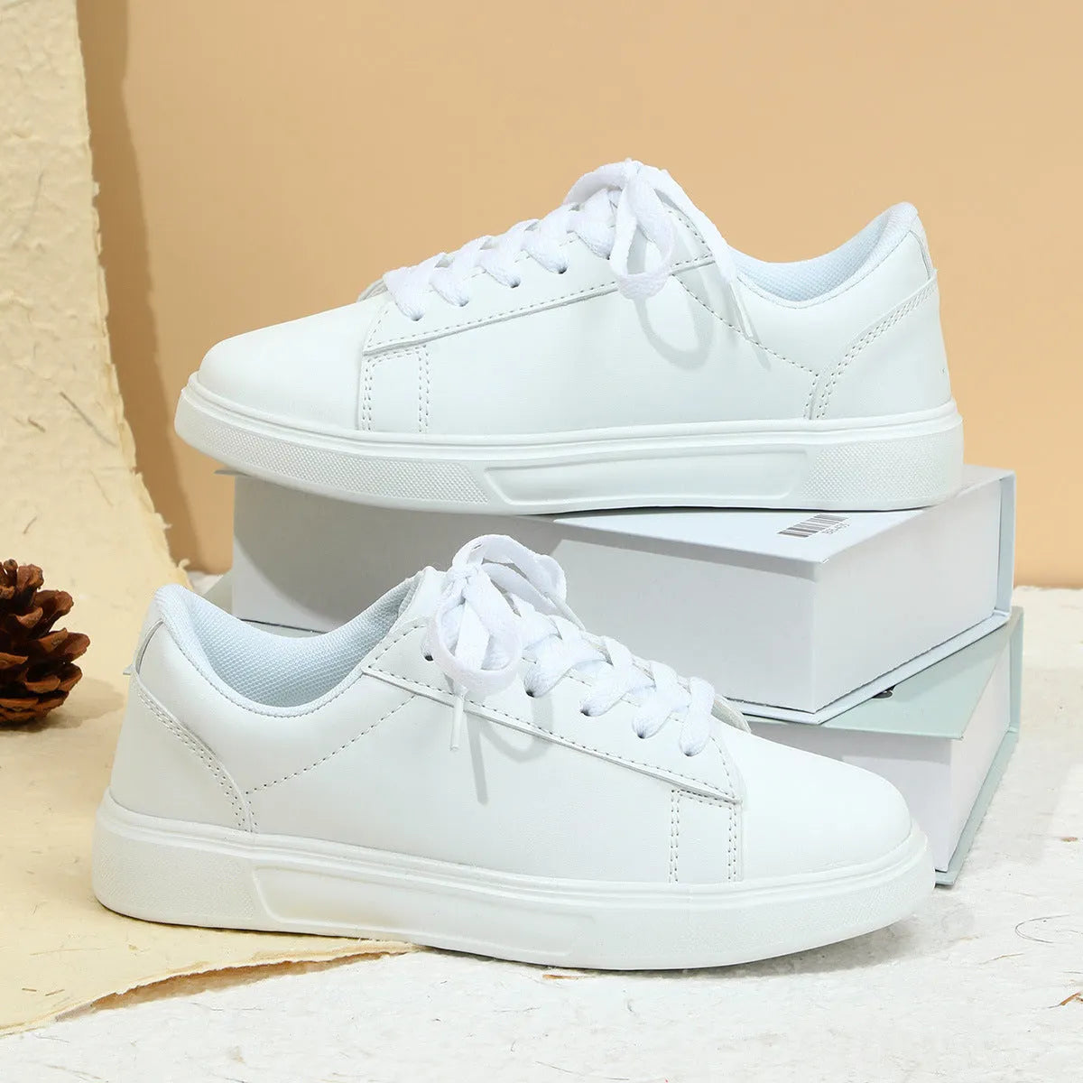 Casual platform sneaker with cross strap detail on artificial PU upper in beige brown colour