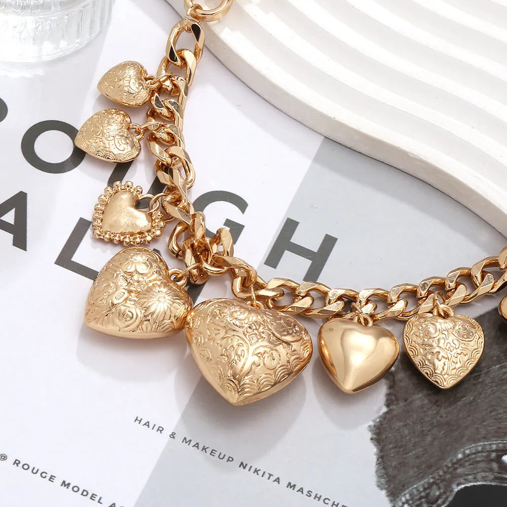 Gold and white K carved heart pendant necklace on alloy chain with adjustable length