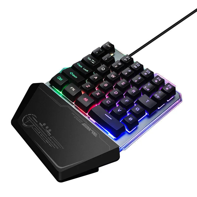 Black G40 Flow Colour one-handed mechanical gaming keyboard with RGB backlit keys on a desk