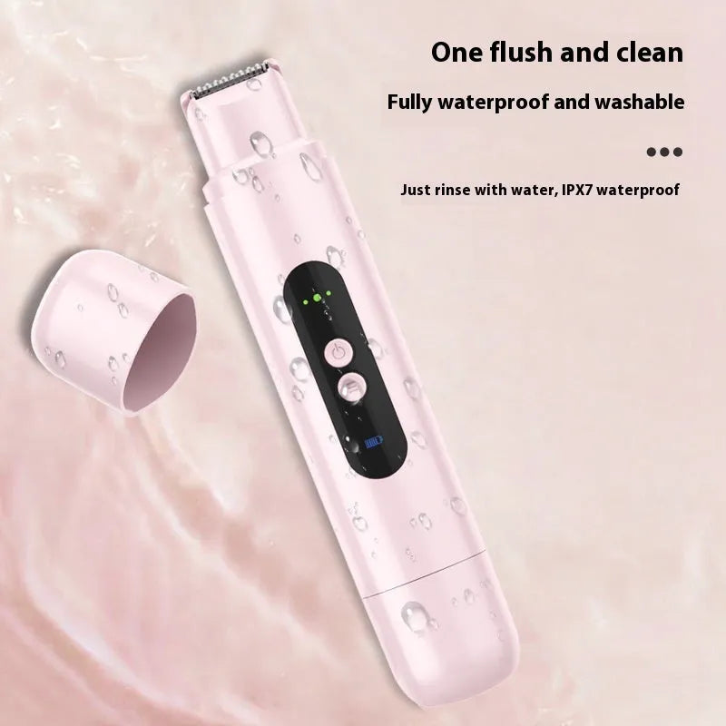 White portable electric armpit hair trimmer with USB cable on pink background