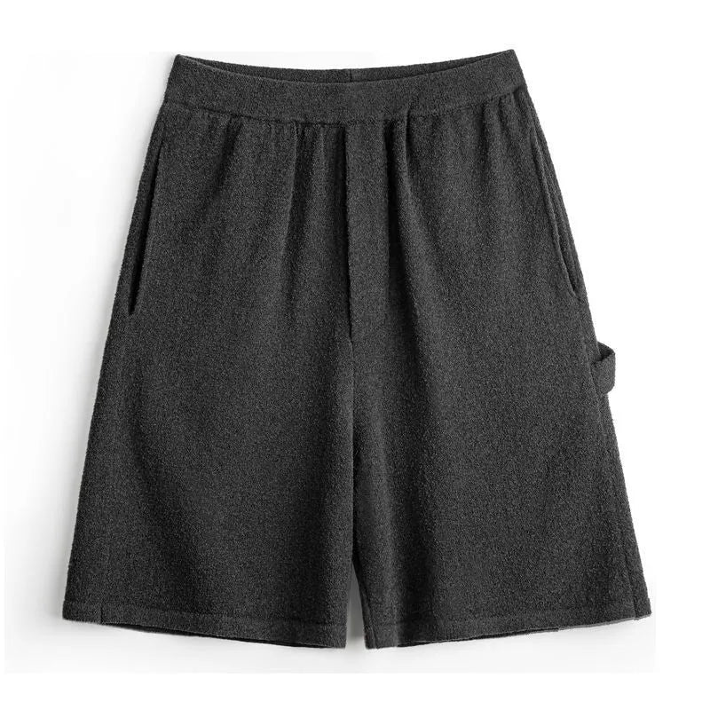 Cement grey polyester sports shorts with straight-leg design and medium elastic waistband