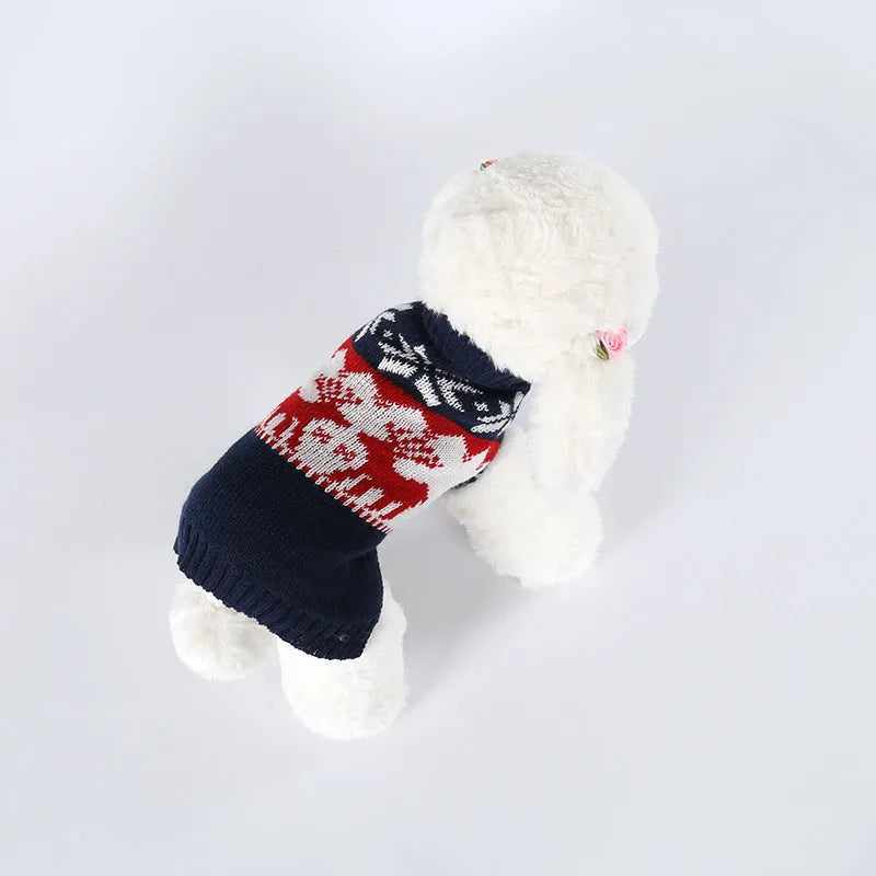 Navy blue knitted dog sweater with Christmas styling on canine model