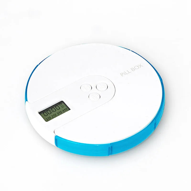 Blue 7-compartment alarm clock pill dispenser showing timer display and storage sections