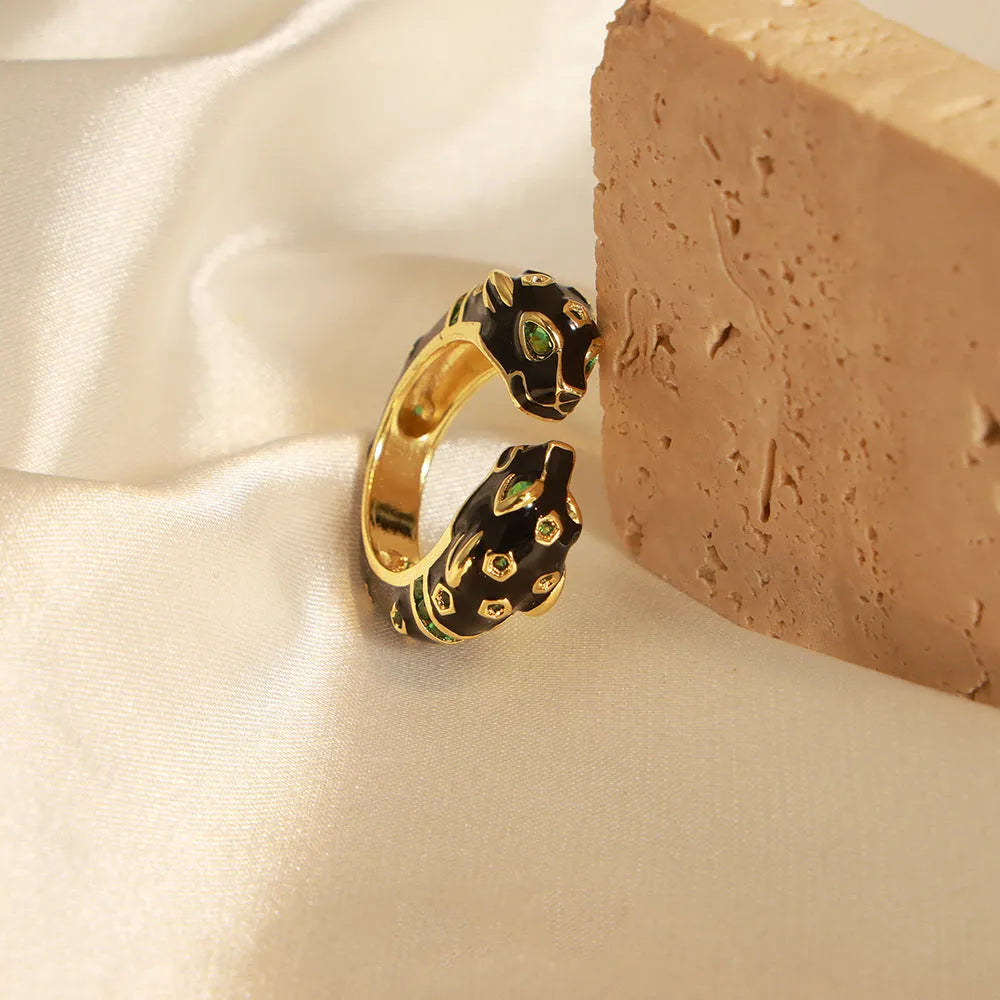 Copper open ring with electroplated black cheetah pattern in geometric shape, size 7