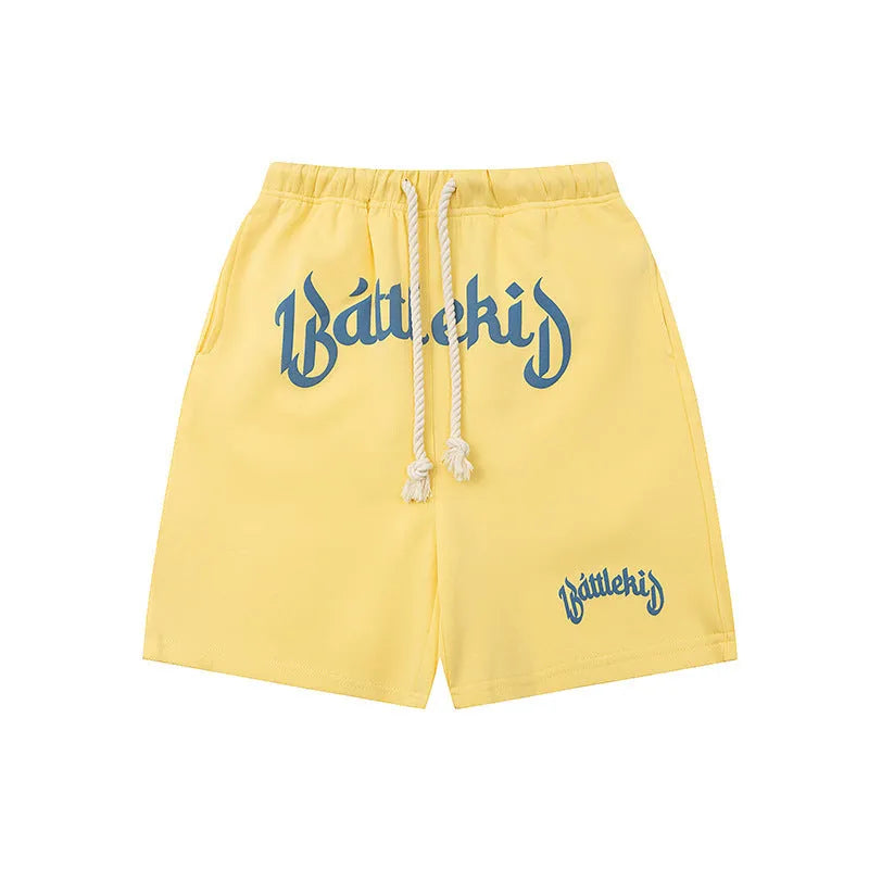 A pair of cropped, loose-fit sweatpants in a cotton blend fabric for casual streetwear.