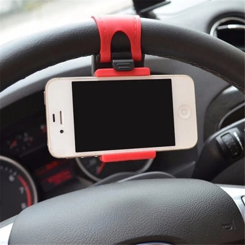 Black universal steering wheel phone holder clip for smartphones showing silicone pad
