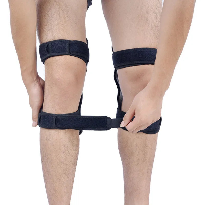 Adjustable knee brace with patella booster spring system in black, blue or green colours