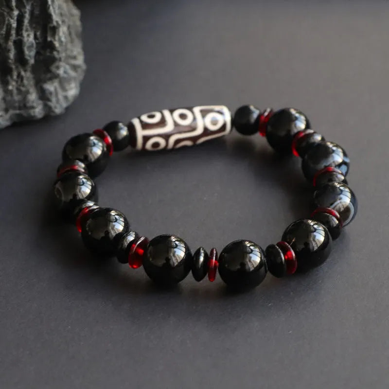 Hand-woven black agate Dzi bead bracelet with geometric design and national style elements