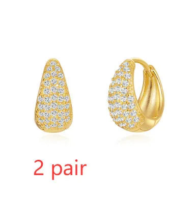 Brass diamond geometric earclip earrings with electroplated gold finish and round elements