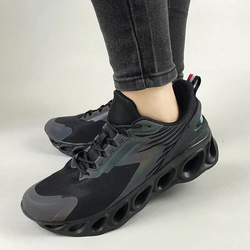 Low-top casual lace-up shoes in mesh material, shown in black, white, and dark blue colour options.