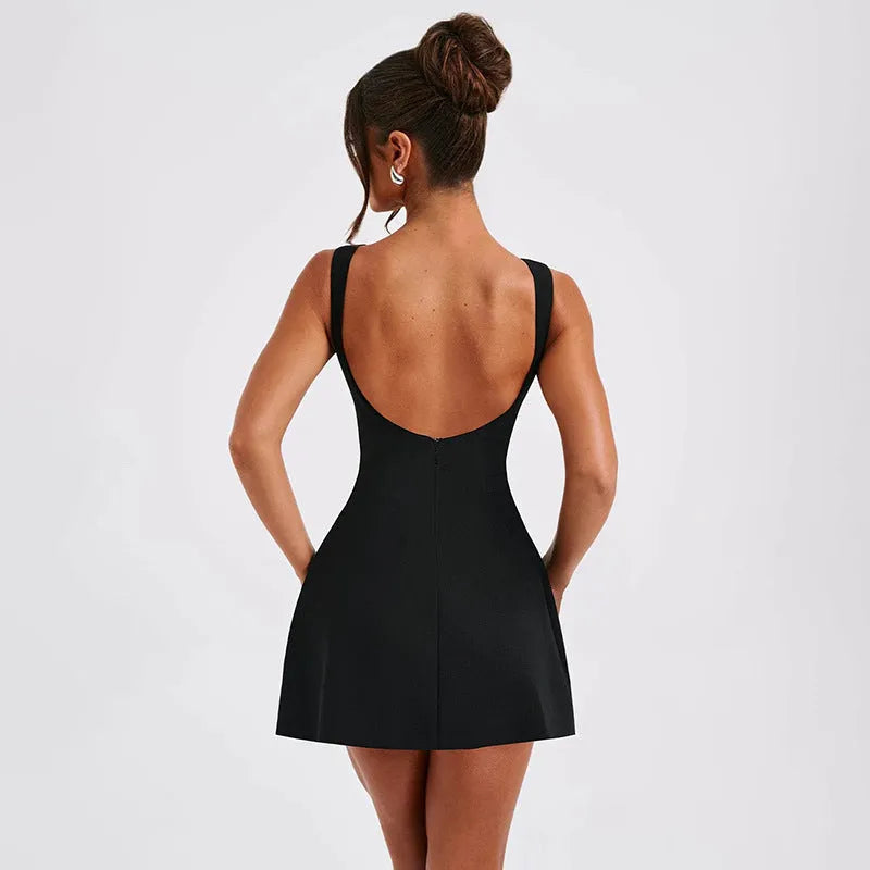 Slim-fitting backless sleeveless summer dress in a solid colour on a hanger, showing high waist and short length.