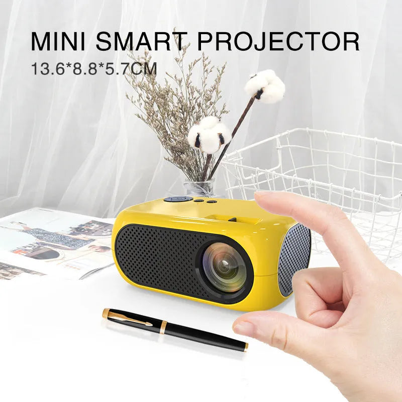 M24 micro mini portable LED projector in gold or white with compact design